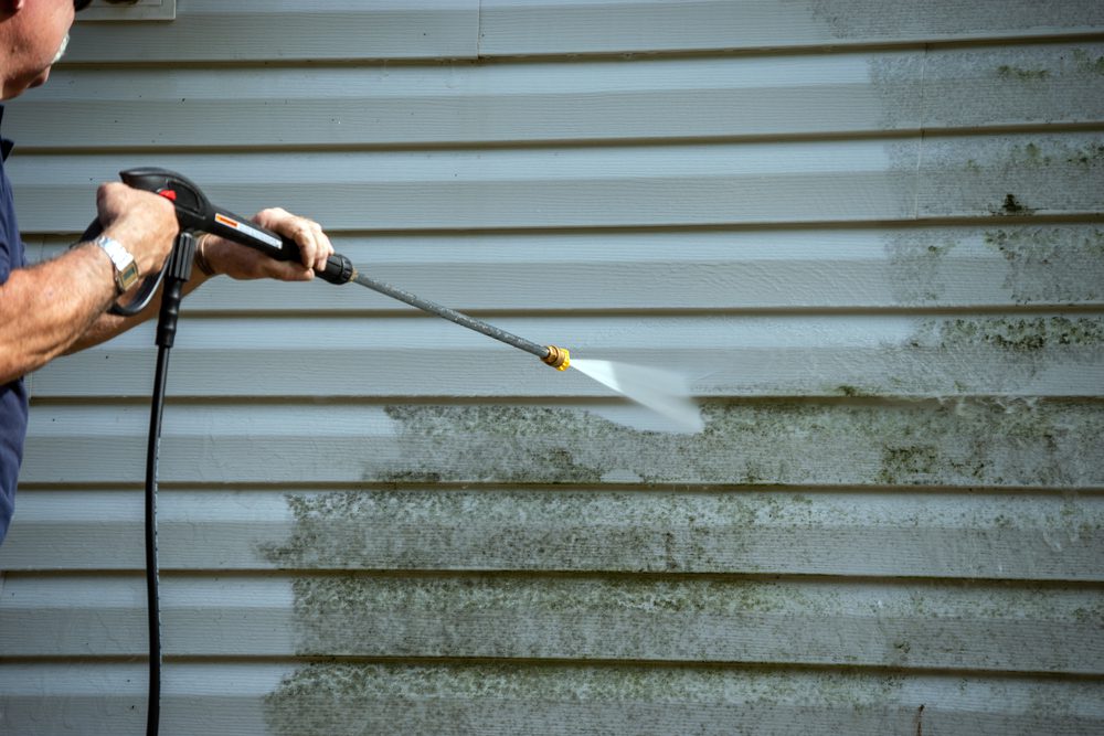 How to Safely Power Wash Vinyl Siding Without Stripping It