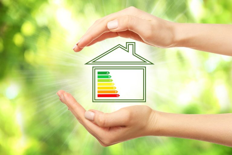 Female,Hands,And,House,With,Energy,Efficiency,Scale,Image,On