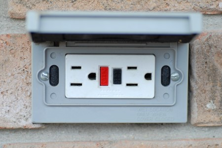 pressure washing around outdoor electrical boxes
