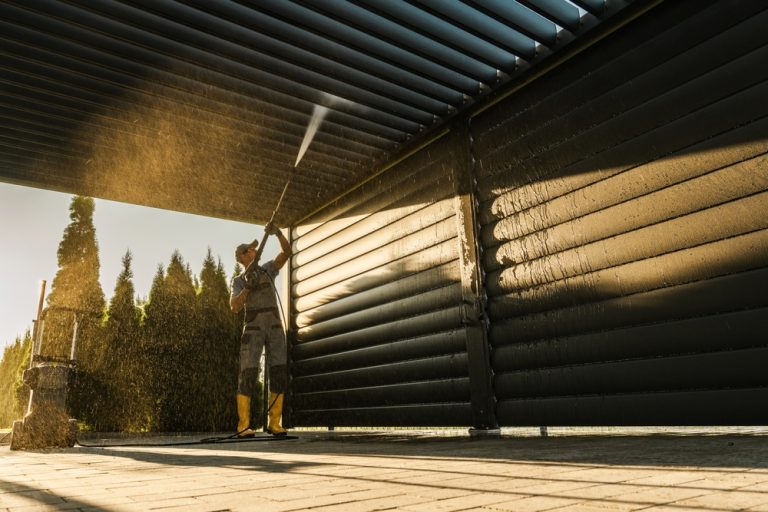 Men,With,Pressure,Washer,Cleaning,His,Residential,Aluminium,Carport,Pergola.
