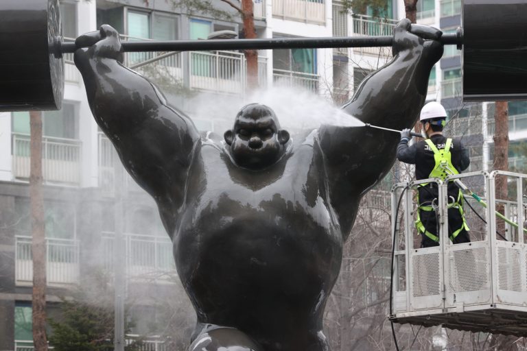 pressure wash statue